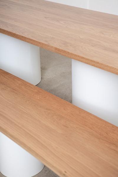 long modern dining table and bench (detail)